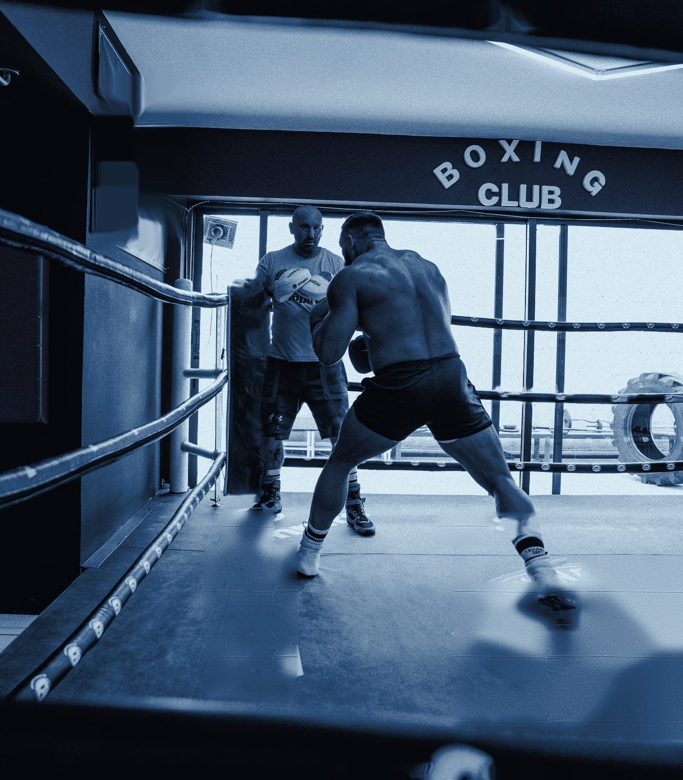 Fighter wrapping hands before a session